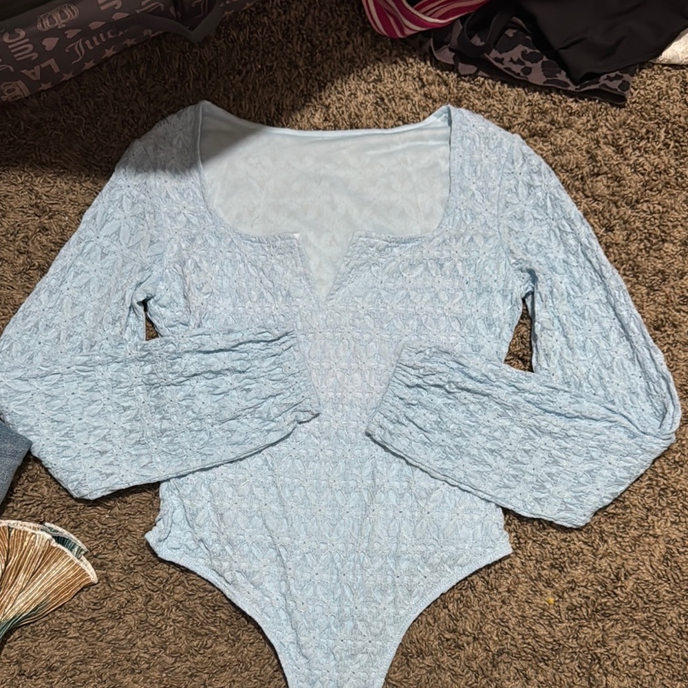 women’s blue lace bodysuit